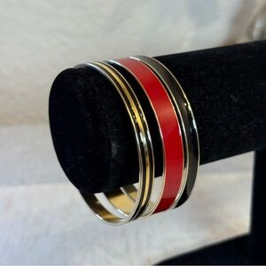 Set of 3 enameled bangles. Red, black, silver and gold tones.